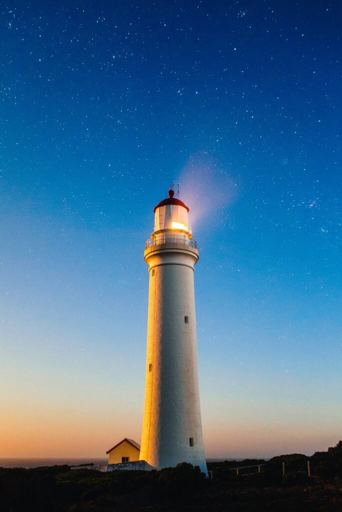 lighthouse, shore, coast, water, coastline, light, navigation, ocean, beach, travel, maritime, nature, seascape, seashore, marine